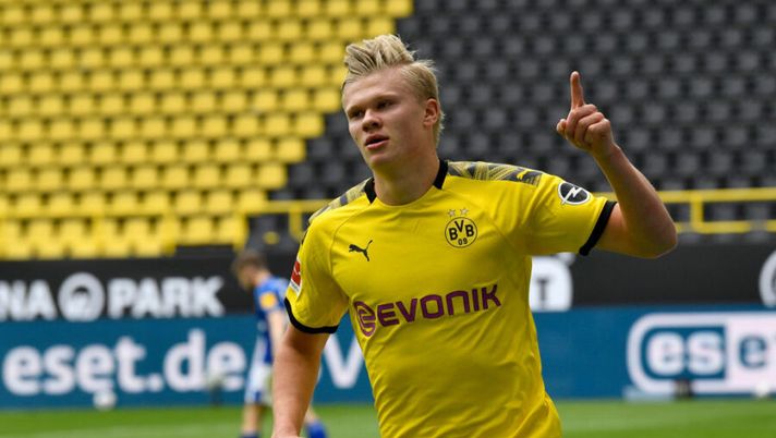 DORTMUND, GERMANY - MAY 16: Erling Haaland of Borussia Dortmund celebrates scoring his team's first goal during the Bundesliga match between Borussia Dortmund and FC Schalke 04 at Signal Iduna Park on May 16, 2020 in Dortmund, Germany. The Bundesliga and Second Bundesliga is the first professional league to resume the season after the nationwide lockdown due to the ongoing Coronavirus (COVID-19) pandemic. All matches until the end of the season will be played behind closed doors. (Photo by Martin Meissner/Pool via Getty Images) DORTMUND, GERMANY - MAY 16: Erling Haaland of Borussia Dortmund celebrates scoring his team's first goal during the Bundesliga match between Borussia Dortmund and FC Schalke 04 at Signal Iduna Park on May 16, 2020 in Dortmund, Germany. The Bundesliga and Second Bundesliga is the first professional league to resume the season after the nationwide lockdown due to the ongoing Coronavirus (COVID-19) pandemic. All matches until the end of the season will be played behind closed doors. (Photo by Martin Meissner/Pool via Getty Images)