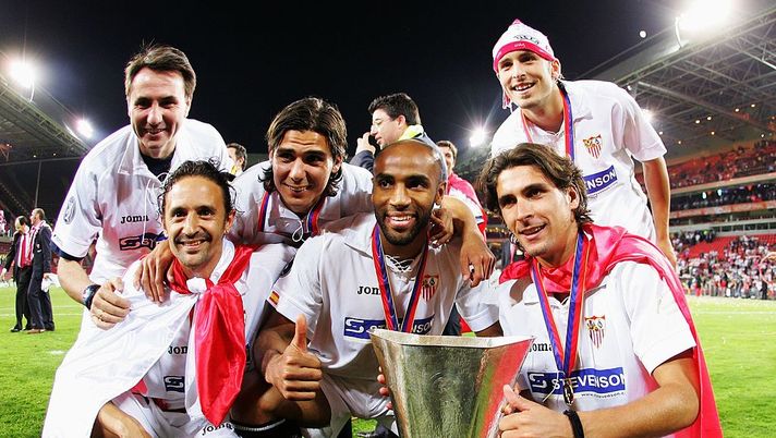 EINDHOVEN, NETHERLANDS - MAY 10: Frederic Kanoute of Sevilla FC poses with his teammate after they won the UEFA Cup final against Middlesbrough FC on May 10, 2006 at the PSV Stadion in Eindhoven, Netherlands. Sevilla FC won 4-0. (Photo by Jamie McDonald/Getty Images) EINDHOVEN, NETHERLANDS - MAY 10: Frederic Kanoute of Sevilla FC poses with his teammate after they won the UEFA Cup final against Middlesbrough FC on May 10, 2006 at the PSV Stadion in Eindhoven, Netherlands. Sevilla FC won 4-0. (Photo by Jamie McDonald/Getty Images)