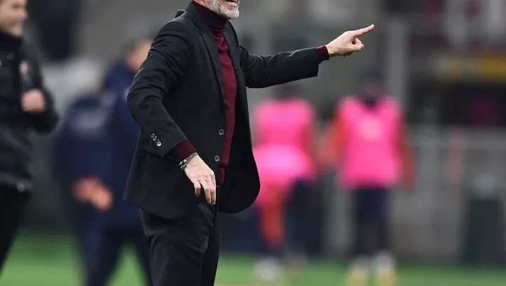 MILAN, ITALY - JANUARY 13: Head coach of AC Milan Stefano Pioli reacts during the Coppa Italia match between AC Milan and Genoa CFC at Stadio Giuseppe Meazza on January 13, 2022 in Milan, Italy. (Photo by Claudio Villa/AC Milan via Getty Images)