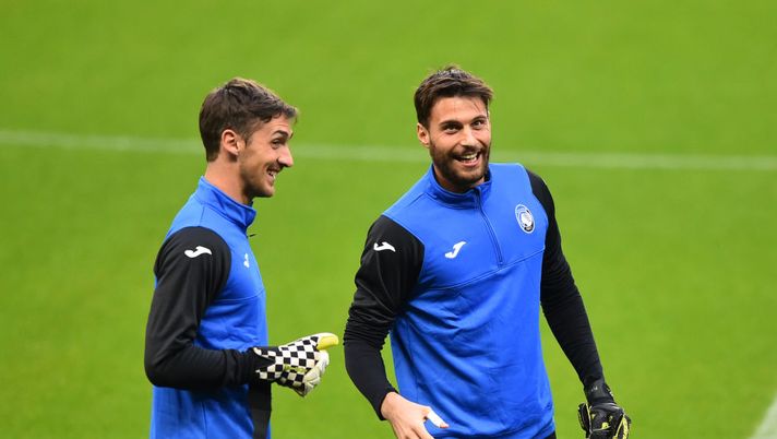 MANCHESTER, ENGLAND - OCTOBER 21: Francesco Rossi (L) and Marco Sportiello of Atalanta speak during a training session ahead of the UEFA Champions League Group C match against Manchester City at Etihad Stadium on October 21, 2019 in Manchester, England. (Photo by Nathan Stirk/Getty Images) MANCHESTER, ENGLAND - OCTOBER 21: Francesco Rossi (L) and Marco Sportiello of Atalanta speak during a training session ahead of the UEFA Champions League Group C match against Manchester City at Etihad Stadium on October 21, 2019 in Manchester, England. (Photo by Nathan Stirk/Getty Images)