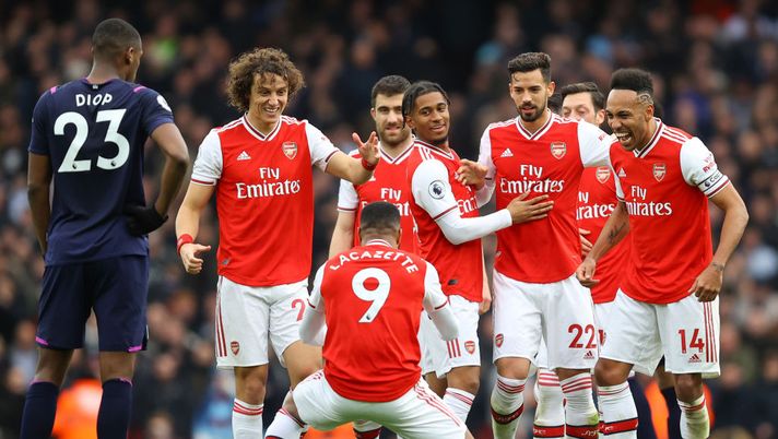 LONDON, ENGLAND - MARCH 07: Alexandre Lacazette of Arsenal celebrates with teammates after scoring his team's first goal which was awarded after a VAR review during the Premier League match between Arsenal FC and West Ham United at Emirates Stadium on March 07, 2020 in London, United Kingdom. (Photo by Julian Finney/Getty Images) LONDON, ENGLAND - MARCH 07: Alexandre Lacazette of Arsenal celebrates with teammates after scoring his team's first goal which was awarded after a VAR review during the Premier League match between Arsenal FC and West Ham United at Emirates Stadium on March 07, 2020 in London, United Kingdom. (Photo by Julian Finney/Getty Images)
