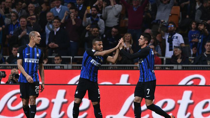 MILAN, ITALY - APRIL 17: Joao Cancelo of FC Internazionale celebrates with Rafinha after scoring the opening goal during the serie A match between FC Internazionale and Cagliari Calcio at Stadio Giuseppe Meazza on April 17, 2018 in Milan, Italy. (Photo by Claudio Villa - Inter/Inter via Getty Images) MILAN, ITALY - APRIL 17: Joao Cancelo of FC Internazionale celebrates with Rafinha after scoring the opening goal during the serie A match between FC Internazionale and Cagliari Calcio at Stadio Giuseppe Meazza on April 17, 2018 in Milan, Italy. (Photo by Claudio Villa - Inter/Inter via Getty Images)