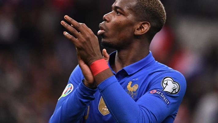 France's midfielder Paul Pogba celebrates after France's win of the UEFA Euro 2020 Group H qualification football match between France and Iceland at the Stade de France stadium in Saint-Denis, north of Paris, on March 25, 2019. - The match ended 4-0 for France. (Photo by FRANCK FIFE / AFP) (Photo credit should read FRANCK FIFE/AFP/Getty Images) Gazzetta: “Pogba, l’offerta della Juve è questa: incontro subito e il piano del club…” - immagine 1