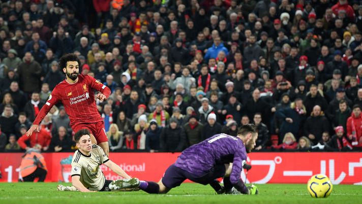 LIVERPOOL, ENGLAND - JANUARY 19: Mohamed Salah scores the 2nd goal during the Premier League match between Liverpool FC and Manchester United at Anfield on January 19, 2020 in Liverpool, United Kingdom. (Photo by Michael Regan/Getty Images) LIVERPOOL, ENGLAND - JANUARY 19: Mohamed Salah scores the 2nd goal during the Premier League match between Liverpool FC and Manchester United at Anfield on January 19, 2020 in Liverpool, United Kingdom. (Photo by Michael Regan/Getty Images)
