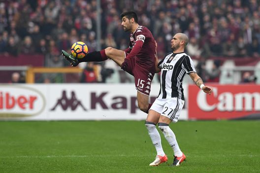 TURIN, ITALY - DECEMBER 11: Marco Benassi (L) of FC Torino in action against Stefano Sturaro of Juventus FC during the Serie A match between FC Torino and Juventus FC at Stadio Olimpico di Torino on December 11, 2016 in Turin, Italy. (Photo by Valerio Pennicino/Getty Images) TURIN, ITALY - DECEMBER 11: Marco Benassi (L) of FC Torino in action against Stefano Sturaro of Juventus FC during the Serie A match between FC Torino and Juventus FC at Stadio Olimpico di Torino on December 11, 2016 in Turin, Italy. (Photo by Valerio Pennicino/Getty Images)