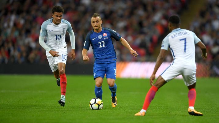 LONDON, ENGLAND - SEPTEMBER 04: Stanislav Lobotka of Slovakia is watched by Dele Alli and Marcus Rashford of England during the FIFA 2018 World Cup Qualifier between England and Slovakia at Wembley Stadium on September 4, 2017 in London, England. (Photo by Mike Hewitt/Getty Images) LONDON, ENGLAND - SEPTEMBER 04: Stanislav Lobotka of Slovakia is watched by Dele Alli and Marcus Rashford of England during the FIFA 2018 World Cup Qualifier between England and Slovakia at Wembley Stadium on September 4, 2017 in London, England. (Photo by Mike Hewitt/Getty Images)