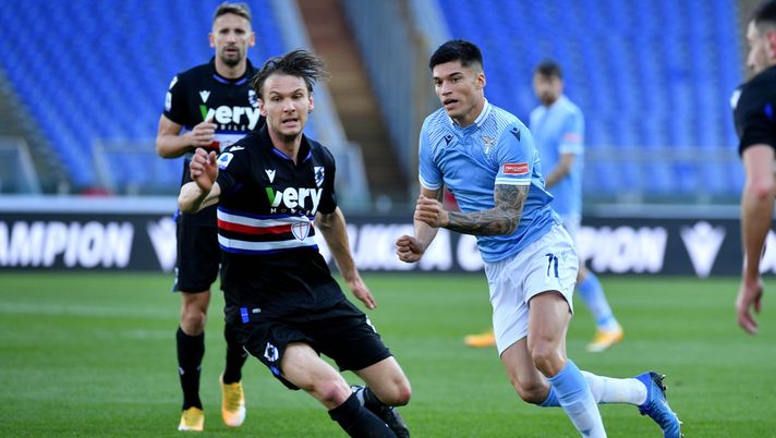 ROME, ITALY - FEBRUARY 20: Joaquin Correa of SS Lazio compete for the ball with Albin Ekdal of UC Sampdoria during the Serie A match between SS Lazio and UC Sampdoria at Stadio Olimpico on February 20, 2021 in Rome, Italy. Sporting stadiums around Italy remain under strict restrictions due to the Coronavirus Pandemic as Government social distancing laws prohibit fans inside venues resulting in games being played behind closed doors. (Photo by Marco Rosi - SS Lazio/Getty Images) ROME, ITALY - FEBRUARY 20: Joaquin Correa of SS Lazio compete for the ball with Albin Ekdal of UC Sampdoria during the Serie A match between SS Lazio and UC Sampdoria at Stadio Olimpico on February 20, 2021 in Rome, Italy. Sporting stadiums around Italy remain under strict restrictions due to the Coronavirus Pandemic as Government social distancing laws prohibit fans inside venues resulting in games being played behind closed doors. (Photo by Marco Rosi - SS Lazio/Getty Images)