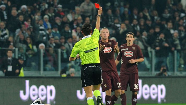TURIN, ITALY - DECEMBER 01:  Kamil Glik (C) of Torino FC receives the red card from referee Gianluca Rocchi during the Serie A match between Juventus and Torino FC at Juventus Arena on December 1, 2012 in Turin, Italy.  (Photo by Valerio Pennicino/Getty Images) 