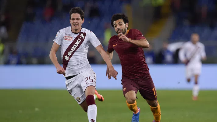 ROME, ITALY - FEBRUARY 19:  AS Roma player Mohamed Salah (R) competes with FC Torino player Sasa Lukic during the Serie A match between AS Roma and FC Torino at Stadio Olimpico on February 19, 2017 in Rome, Italy.  (Photo by Luciano Rossi/AS Roma via Getty Images)