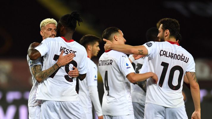 TURIN, ITALY - MAY 12: Franck Kessie of A.C. Milan celebrates with team mates after scoring their side's second goal during the Serie A match between Torino FC and AC Milan at Stadio Olimpico di Torino on May 12, 2021 in Turin, Italy. Sporting stadiums around Italy remain under strict restrictions due to the Coronavirus Pandemic as Government social distancing laws prohibit fans inside venues resulting in games being played behind closed doors. (Photo by Valerio Pennicino/Getty Images) TURIN, ITALY - MAY 12: Franck Kessie of A.C. Milan celebrates with team mates after scoring their side's second goal during the Serie A match between Torino FC and AC Milan at Stadio Olimpico di Torino on May 12, 2021 in Turin, Italy. Sporting stadiums around Italy remain under strict restrictions due to the Coronavirus Pandemic as Government social distancing laws prohibit fans inside venues resulting in games being played behind closed doors. (Photo by Valerio Pennicino/Getty Images)