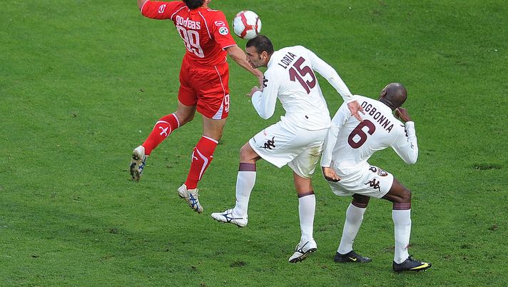 TRIESTE, ITALY - OCTOBER 31: Denis Godeas (L) of US Triestina Calcio competes in the air with Simone Loria (C) Angelo Obinze Ogbonna (R) of Torino FC during the Serie B match US Triestina Calcio and Torino FC at Stadio Nereo Rocco on October 31, 2009 in Trieste, Italy. (Photo by Dino Panato/Getty Images) TRIESTE, ITALY - OCTOBER 31: Denis Godeas (L) of US Triestina Calcio competes in the air with Simone Loria (C) Angelo Obinze Ogbonna (R) of Torino FC during the Serie B match US Triestina Calcio and Torino FC at Stadio Nereo Rocco on October 31, 2009 in Trieste, Italy. (Photo by Dino Panato/Getty Images)