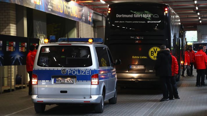 DORTMUND, GERMANY - APRIL 12: The Dortmund team coach arrives for the UEFA Champions League Quarter Final first leg match between Borussia Dortmund and AS Monaco at Signal Iduna Park on April 12, 2017 in Dortmund, Germany. The match was rescheduled after an alleged terrorist attack on the Borussia Dortmund team coach as it made it's way to the stadium. (Photo by Dean Mouhtaropoulos/Bongarts/Getty Images) DORTMUND, GERMANY - APRIL 12: The Dortmund team coach arrives for the UEFA Champions League Quarter Final first leg match between Borussia Dortmund and AS Monaco at Signal Iduna Park on April 12, 2017 in Dortmund, Germany. The match was rescheduled after an alleged terrorist attack on the Borussia Dortmund team coach as it made it's way to the stadium. (Photo by Dean Mouhtaropoulos/Bongarts/Getty Images)