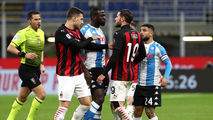 MILAN, ITALY - MARCH 14: Kalidou Koulibaly of SSC Napoli clashes with Theo Hernandez of A.C. Milan during the Serie A match between AC Milan and SSC Napoli at Stadio Giuseppe Meazza on March 14, 2021 in Milan, Italy. Sporting stadiums around Italy remain under strict restrictions due to the Coronavirus Pandemic as Government social distancing laws prohibit fans inside venues resulting in games being played behind closed doors. (Photo by Marco Luzzani/Getty Images) MILAN, ITALY - MARCH 14: Kalidou Koulibaly of SSC Napoli clashes with Theo Hernandez of A.C. Milan during the Serie A match between AC Milan and SSC Napoli at Stadio Giuseppe Meazza on March 14, 2021 in Milan, Italy. Sporting stadiums around Italy remain under strict restrictions due to the Coronavirus Pandemic as Government social distancing laws prohibit fans inside venues resulting in games being played behind closed doors. (Photo by Marco Luzzani/Getty Images)