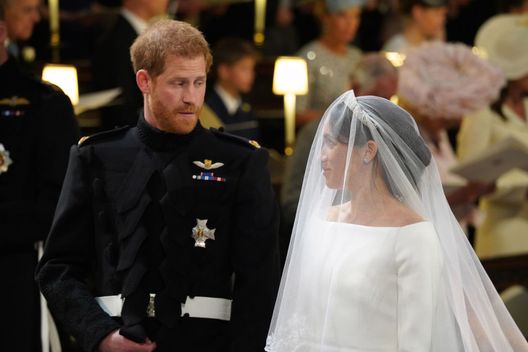 WINDSOR, UNITED KINGDOM - MAY 19: Prince Harry looks at his bride, Meghan Markle, as she arrived accompanied by Prince Charles, Prince of Wales during their wedding in St George's Chapel at Windsor Castle on May 19, 2018 in Windsor, England. (Photo by Jonathan Brady - WPA Pool/Getty Images) WINDSOR, UNITED KINGDOM - MAY 19: Prince Harry looks at his bride, Meghan Markle, as she arrived accompanied by Prince Charles, Prince of Wales during their wedding in St George's Chapel at Windsor Castle on May 19, 2018 in Windsor, England. (Photo by Jonathan Brady - WPA Pool/Getty Images)