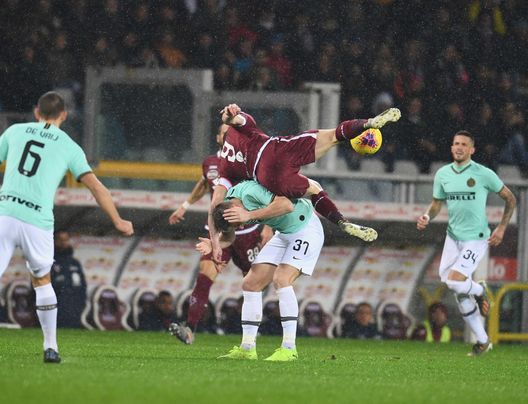  TURIN, ITALY - NOVEMBER 23: Milan Skriniar of FC Internazionale and Andrea Belotti of Torino compete for the ball during the Serie A match between Torino FC and FC Internazionale at Stadio Olimpico di Torino on November 23, 2019 in Turin, Italy. (Photo by Claudio Villa - Inter/Inter via Getty Images ) 