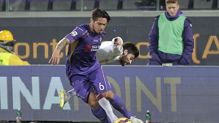 FLORENCE, ITALY - FEBRUARY 22: Juan Manuel Vargas of ACF Fiorentina battles for the ball with Marco Benassi of Torino FC during the Serie A match between ACF Fiorentina and Torino FC at Stadio Artemio Franchi on February 22, 2015 in Florence, Italy. (Photo by Gabriele Maltinti/Getty Images) FLORENCE, ITALY - FEBRUARY 22: Juan Manuel Vargas of ACF Fiorentina battles for the ball with Marco Benassi of Torino FC during the Serie A match between ACF Fiorentina and Torino FC at Stadio Artemio Franchi on February 22, 2015 in Florence, Italy. (Photo by Gabriele Maltinti/Getty Images)