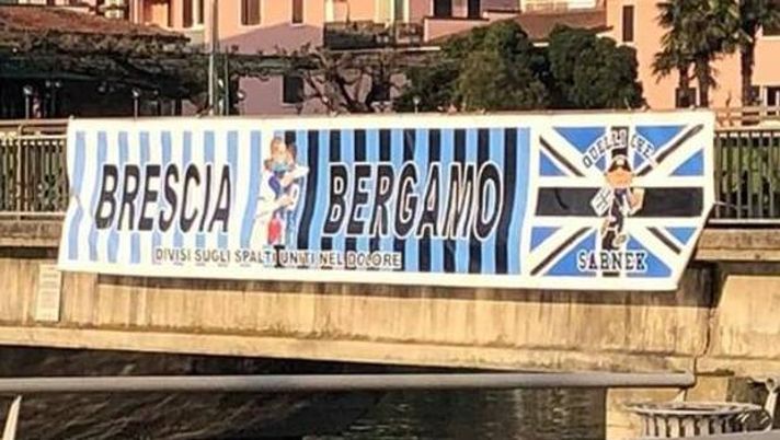 Bergamo e Brescia insieme nell&#8217;emergenza: spunta uno striscione sul ponte di Sarnico 