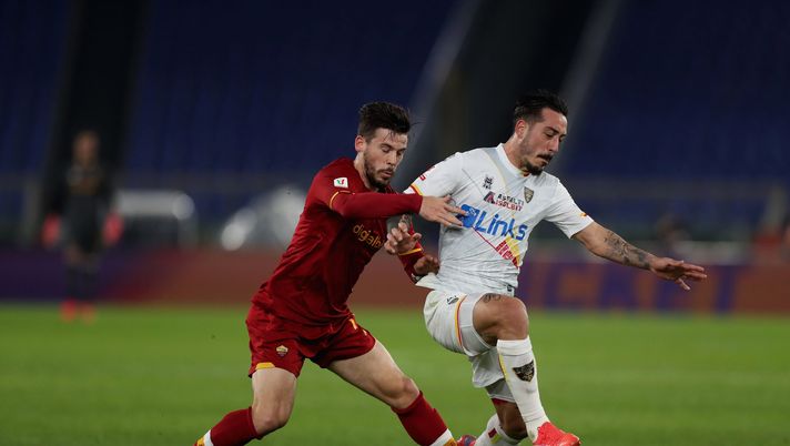 ROME, ITALY - JANUARY 20: Carles Peres of AS Roma competes for the ball with Francesco Di Mariano of US Lecce during the Coppa Italia match between AS Roma and US Lecce at Stadio Olimpico on January 20, 2022 in Rome, Italy. (Photo by Paolo Bruno/Getty Images) Palermo