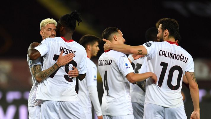 TURIN, ITALY - MAY 12: Franck Kessie of A.C. Milan celebrates with team mates after scoring their side's second goal during the Serie A match between Torino FC and AC Milan at Stadio Olimpico di Torino on May 12, 2021 in Turin, Italy. Sporting stadiums around Italy remain under strict restrictions due to the Coronavirus Pandemic as Government social distancing laws prohibit fans inside venues resulting in games being played behind closed doors. (Photo by Valerio Pennicino/Getty Images) TURIN, ITALY - MAY 12: Franck Kessie of A.C. Milan celebrates with team mates after scoring their side's second goal during the Serie A match between Torino FC and AC Milan at Stadio Olimpico di Torino on May 12, 2021 in Turin, Italy. Sporting stadiums around Italy remain under strict restrictions due to the Coronavirus Pandemic as Government social distancing laws prohibit fans inside venues resulting in games being played behind closed doors. (Photo by Valerio Pennicino/Getty Images)