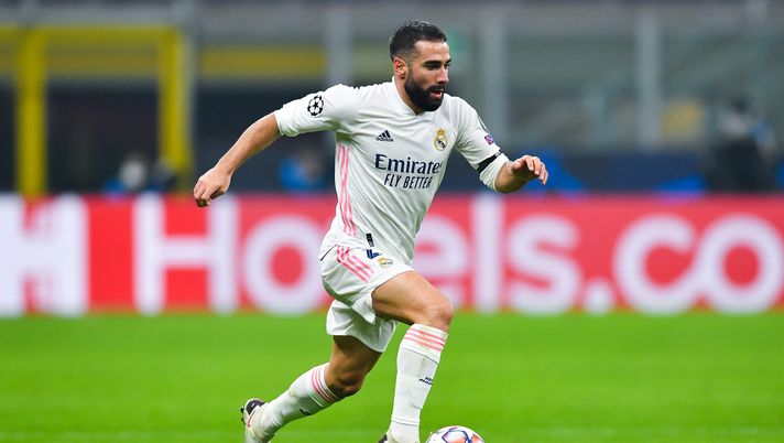 MILAN, ITALY - NOVEMBER 25: Daniel Carvajal of Real Madrid runs with the ball during the UEFA Champions League Group B stage match between FC Internazionale and Real Madrid at Stadio Giuseppe Meazza on November 25, 2020 in Milan, Italy. Football Stadiums around Europe remain empty due to the Coronavirus Pandemic as Government social distancing laws prohibit fans inside venues resulting in fixtures being played behind closed doors. (Photo by Valerio Pennicino/Getty Images) MILAN, ITALY - NOVEMBER 25: Daniel Carvajal of Real Madrid runs with the ball during the UEFA Champions League Group B stage match between FC Internazionale and Real Madrid at Stadio Giuseppe Meazza on November 25, 2020 in Milan, Italy. Football Stadiums around Europe remain empty due to the Coronavirus Pandemic as Government social distancing laws prohibit fans inside venues resulting in fixtures being played behind closed doors. (Photo by Valerio Pennicino/Getty Images)