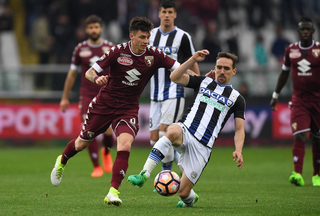  TURIN, ITALY - APRIL 02:  Daniele Baselli (L) of FC Torino is tackled by Sven Kums of Udinese Calcio during the Serie A match between FC Torino and Udinese Calcio at Stadio Olimpico di Torino on April 2, 2017 in Turin, Italy.  (Photo by Valerio Pennicino/Getty Images) 