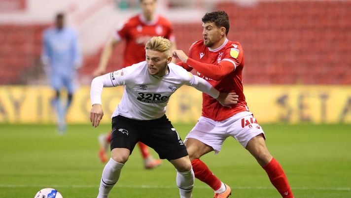 NOTTINGHAM, ENGLAND - OCTOBER 23: Kamil Jozwiak of Derby County battles for possession with Nicholas Ioannou of Nottingham Forest during the Sky Bet Championship match between Nottingham Forest and Brentford at City Ground on October 23, 2020 in Nottingham, England. Sporting stadiums around the UK remain under strict restrictions due to the Coronavirus Pandemic as Government social distancing laws prohibit fans inside venues resulting in games being played behind closed doors. (Photo by Alex Pantling/Getty Images) NOTTINGHAM, ENGLAND - OCTOBER 23: Kamil Jozwiak of Derby County battles for possession with Nicholas Ioannou of Nottingham Forest during the Sky Bet Championship match between Nottingham Forest and Brentford at City Ground on October 23, 2020 in Nottingham, England. Sporting stadiums around the UK remain under strict restrictions due to the Coronavirus Pandemic as Government social distancing laws prohibit fans inside venues resulting in games being played behind closed doors. (Photo by Alex Pantling/Getty Images)