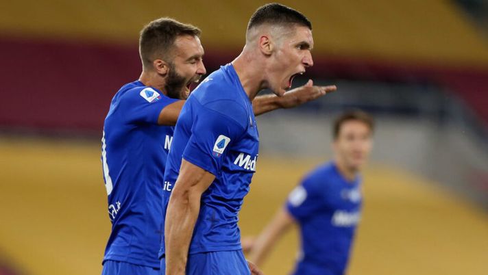 ROME, ITALY - JULY 26: Nikola Milenkovic with his teammate of ACF Fiorentina celebrates after scoring the team's first goal during the Serie A match between AS Roma and ACF Fiorentina at Stadio Olimpico on July 26, 2020 in Rome, Italy. (Photo by Paolo Bruno/Getty Images) Ecco cinque difensori da schierare al fantacalcio alla 17a giornata, tra centrali e terzini - immagine 1