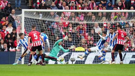 BILBAO, SPAIN - APRIL 15: Inaki Williams of Athletic Club (obscured) scores the team's first goal past Alejandro Remiro of Real Sociedad during the LaLiga Santander match between Athletic Club and Real Sociedad at San Mames Stadium on April 15, 2023 in Bilbao, Spain. (Photo by Juan Manuel Serrano Arce/Getty Images)