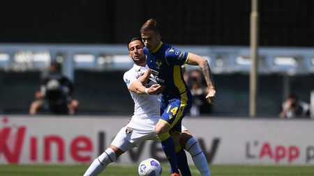 VERONA, ITALY - MAY 09: Rolando Mandragora of Torino FC competes for the ball with Ivan Ilic of Hellas Verona during the Serie A match between Hellas Verona FC and Torino FC at Stadio Marcantonio Bentegodi on May 09, 2021 in Verona, Italy. Sporting stadiums around Italy remain under strict restrictions due to the Coronavirus Pandemic as Government social distancing laws prohibit fans inside venues resulting in games being played behind closed doors. (Photo by Alessandro Sabattini/Getty Images) VERONA, ITALY - MAY 09: Rolando Mandragora of Torino FC competes for the ball with Ivan Ilic of Hellas Verona during the Serie A match between Hellas Verona FC and Torino FC at Stadio Marcantonio Bentegodi on May 09, 2021 in Verona, Italy. Sporting stadiums around Italy remain under strict restrictions due to the Coronavirus Pandemic as Government social distancing laws prohibit fans inside venues resulting in games being played behind closed doors. (Photo by Alessandro Sabattini/Getty Images)