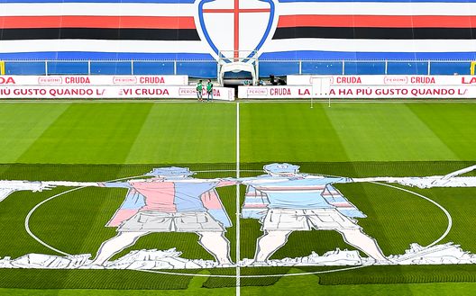 GENOA, ITALY - JULY 22: A giant banner is seen on the pitch showing a Genoa fan and a Sampdoria fan in memory of the Morandi highway bridges collapse before the Serie A match between UC Sampdoria and Genoa CFC at Stadio Luigi Ferraris on July 22, 2020 in Genoa, Italy. (Photo by Paolo Rattini/Getty Images) GENOA, ITALY - JULY 22: A giant banner is seen on the pitch showing a Genoa fan and a Sampdoria fan in memory of the Morandi highway bridges collapse before the Serie A match between UC Sampdoria and Genoa CFC at Stadio Luigi Ferraris on July 22, 2020 in Genoa, Italy. (Photo by Paolo Rattini/Getty Images)