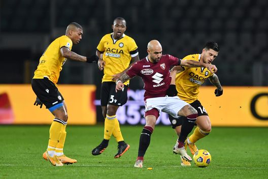 TURIN, ITALY - DECEMBER 12: Simone Zaza of Torino F.C. and Kevin Bonifazi of Udinese Calcio battle for the ball during the Serie A match between Torino FC and Udinese Calcio at Stadio Olimpico di Torino on December 12, 2020 in Turin, Italy. Sporting stadiums around Italy remain under strict restrictions due to the Coronavirus Pandemic as Government social distancing laws prohibit fans inside venues resulting in games being played behind closed doors. (Photo by Valerio Pennicino/Getty Images) TURIN, ITALY - DECEMBER 12: Simone Zaza of Torino F.C. and Kevin Bonifazi of Udinese Calcio battle for the ball during the Serie A match between Torino FC and Udinese Calcio at Stadio Olimpico di Torino on December 12, 2020 in Turin, Italy. Sporting stadiums around Italy remain under strict restrictions due to the Coronavirus Pandemic as Government social distancing laws prohibit fans inside venues resulting in games being played behind closed doors. (Photo by Valerio Pennicino/Getty Images)
