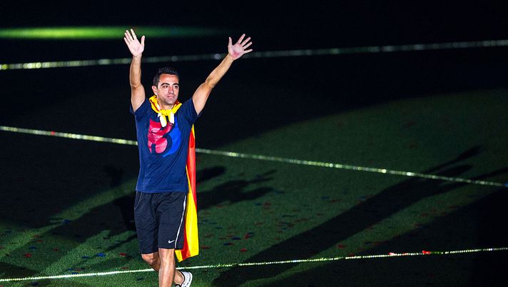 BARCELONA, SPAIN - JUNE 07: Xavi Hernandez of FC Barcelona waves during their victory parade after winning the UEFA Champions League Final at the Camp Nou Stadium on June 7, 2015 in Barcelona, Spain. (Photo by David Ramos/Getty Images) BARCELONA, SPAIN - JUNE 07: Xavi Hernandez of FC Barcelona waves during their victory parade after winning the UEFA Champions League Final at the Camp Nou Stadium on June 7, 2015 in Barcelona, Spain. (Photo by David Ramos/Getty Images)