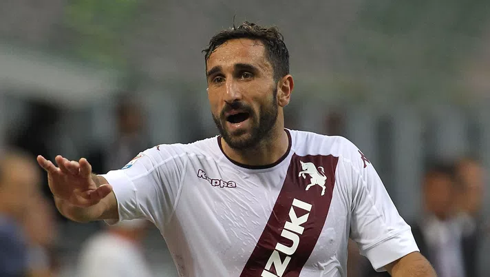 MILAN, ITALY - AUGUST 21:  Cristian Molinaro of Torino FC gestures during the Serie A match between AC Milan and FC Torino at Stadio Giuseppe Meazza on August 21, 2016 in Milan, Italy.  (Photo by Marco Luzzani/Getty Images)