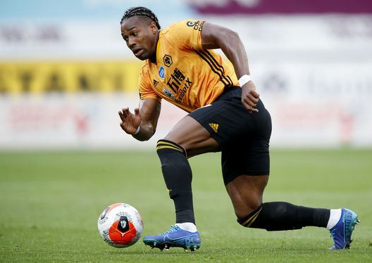 BURNLEY, ENGLAND - JULY 15: Adama Traore of Wolverhampton Wanderers in action during the Premier League match between Burnley FC and Wolverhampton Wanderers at Turf Moor on July 15, 2020 in Burnley, England. Football Stadiums around Europe remain empty due to the Coronavirus Pandemic as Government social distancing laws prohibit fans inside venues resulting in all fixtures being played behind closed doors. (Photo by Clive Brunskill/Getty Images) BURNLEY, ENGLAND - JULY 15: Adama Traore of Wolverhampton Wanderers in action during the Premier League match between Burnley FC and Wolverhampton Wanderers at Turf Moor on July 15, 2020 in Burnley, England. Football Stadiums around Europe remain empty due to the Coronavirus Pandemic as Government social distancing laws prohibit fans inside venues resulting in all fixtures being played behind closed doors. (Photo by Clive Brunskill/Getty Images)