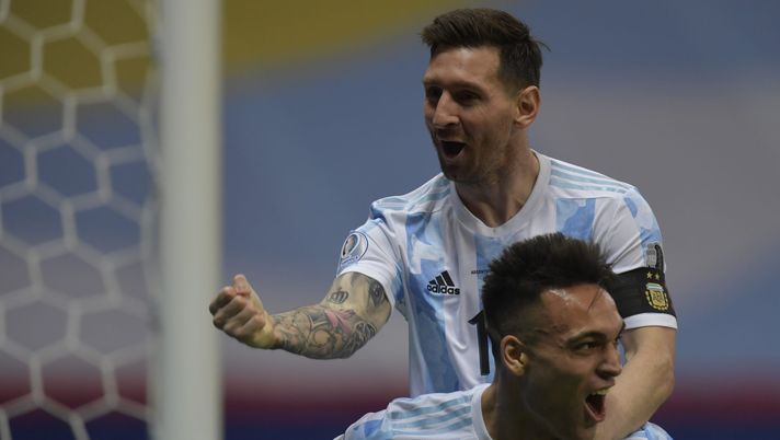 BRASILIA, BRAZIL - JULY 06: Lautaro Martinez of Argentina celebrates with teammate Lionel Messi after scoring the first goal of his team during a semi-final match of Copa America Brazil 2021 between Argentina and Colombia at Mane Garrincha Stadium on July 06, 2021 in Brasilia, Brazil. (Photo by Pedro Vilela/Getty Images) BRASILIA, BRAZIL - JULY 06: Lautaro Martinez of Argentina celebrates with teammate Lionel Messi after scoring the first goal of his team during a semi-final match of Copa America Brazil 2021 between Argentina and Colombia at Mane Garrincha Stadium on July 06, 2021 in Brasilia, Brazil. (Photo by Pedro Vilela/Getty Images)