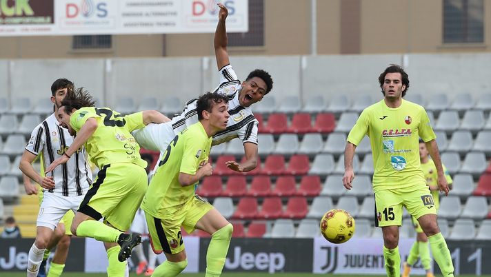ALESSANDRIA, ITALY - FEBRUARY 21: Marley Ake of Juventus U23 challenged by Andrea Adamoli of Lucchese during the Serie C match between Juventus U23 and Lucchese at Stadio Giuseppe Moccagatta on February 21, 2021 in Alessandria, Italy. (Photo by Juventus FC/Juventus FC via Getty Images) 