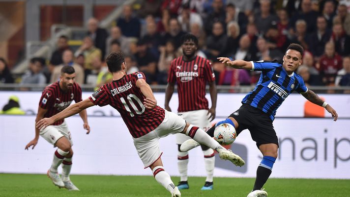 Hakan Calhanoglu e Lautaro Martinez in Milan-Inter, Getty Images 