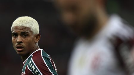 RIO DE JANEIRO, BRAZIL - OCTOBER 23: John Kennedy (L) of Fluminense looks on during a match between Fluminense and Flamengo as part of Brasileirao 2021 at Maracana Stadium on October 23, 2021 in Rio de Janeiro, Brazil. (Photo by Buda Mendes/Getty Images)