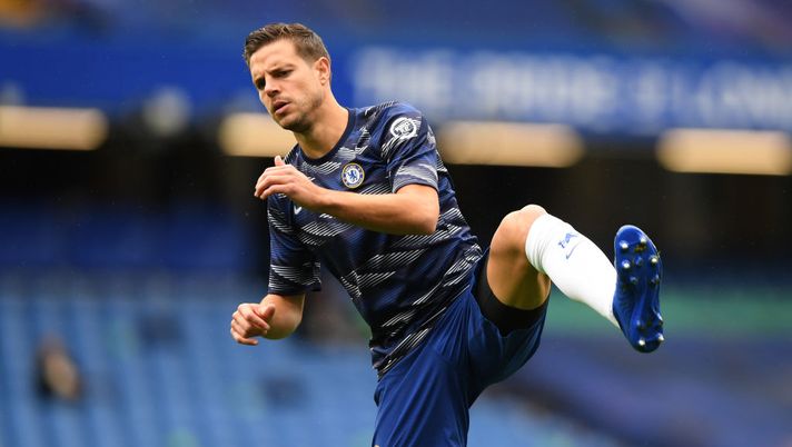 LONDON, ENGLAND - OCTOBER 03: Cesar Azpilicueta of Chelsea warms up prior to the Premier League match between Chelsea and Crystal Palace at Stamford Bridge on October 03, 2020 in London, England. Sporting stadiums around the UK remain under strict restrictions due to the Coronavirus Pandemic as Government social distancing laws prohibit fans inside venues resulting in games being played behind closed doors. (Photo by Mike Hewitt/Getty Images) LONDON, ENGLAND - OCTOBER 03: Cesar Azpilicueta of Chelsea warms up prior to the Premier League match between Chelsea and Crystal Palace at Stamford Bridge on October 03, 2020 in London, England. Sporting stadiums around the UK remain under strict restrictions due to the Coronavirus Pandemic as Government social distancing laws prohibit fans inside venues resulting in games being played behind closed doors. (Photo by Mike Hewitt/Getty Images)