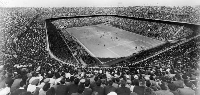 A large crowd watching a football match at the San Siro Stadium in Milan, originally built in 1926.   (Photo by Keystone/Getty Images) 