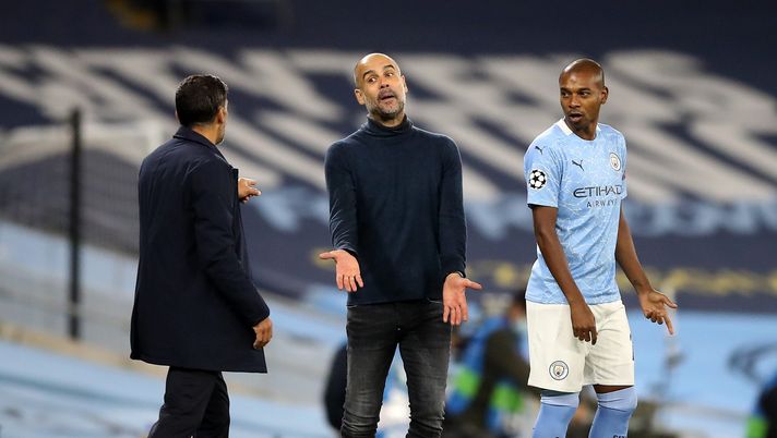 MANCHESTER, ENGLAND - OCTOBER 21: Pep Guardiola, Manager of Manchester City and Sergio Conceicao, Manager of FC Porto clash during the UEFA Champions League Group C stage match between Manchester City and FC Porto at Etihad Stadium on October 21, 2020 in Manchester, England. Sporting stadiums around the UK remain under strict restrictions due to the Coronavirus Pandemic as Government social distancing laws prohibit fans inside venues resulting in games being played behind closed doors. (Photo by Martin Rickett - Pool/Getty Images) MANCHESTER, ENGLAND - OCTOBER 21: Pep Guardiola, Manager of Manchester City and Sergio Conceicao, Manager of FC Porto clash during the UEFA Champions League Group C stage match between Manchester City and FC Porto at Etihad Stadium on October 21, 2020 in Manchester, England. Sporting stadiums around the UK remain under strict restrictions due to the Coronavirus Pandemic as Government social distancing laws prohibit fans inside venues resulting in games being played behind closed doors. (Photo by Martin Rickett - Pool/Getty Images)