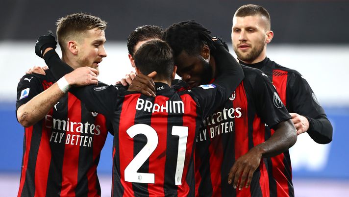 GENOA, ITALY - DECEMBER 06: Franck Kessie of AC Milan celebrates with team mate Brahim Diaz and Alexis Saelemaekers of AC Milan after scoring their sides first goal from the penalty spot during the Serie A match between UC Sampdoria and AC Milan at Stadio Luigi Ferraris on December 06, 2020 in Genoa, Italy. Sporting stadiums around Italy remain under strict restrictions due to the Coronavirus Pandemic as Government social distancing laws prohibit fans inside venues resulting in games being played behind closed doors. (Photo by Marco Luzzani/Getty Images) GENOA, ITALY - DECEMBER 06: Franck Kessie of AC Milan celebrates with team mate Brahim Diaz and Alexis Saelemaekers of AC Milan after scoring their sides first goal from the penalty spot during the Serie A match between UC Sampdoria and AC Milan at Stadio Luigi Ferraris on December 06, 2020 in Genoa, Italy. Sporting stadiums around Italy remain under strict restrictions due to the Coronavirus Pandemic as Government social distancing laws prohibit fans inside venues resulting in games being played behind closed doors. (Photo by Marco Luzzani/Getty Images)