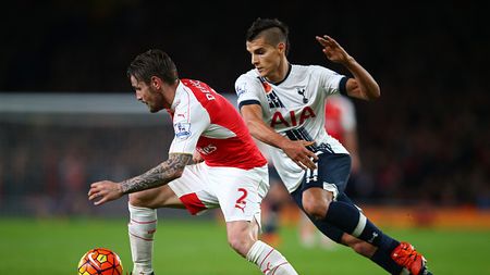 LONDON, ENGLAND - NOVEMBER 08: Mathieu Debuchy of Arsenal holds off Erik Lamela of Spurs during the Barclays Premier League match between Arsenal and Tottenham Hotspur at the Emirates Stadium on November 8, 2015 in London, England. (Photo by Clive Rose/Getty Images) LONDON, ENGLAND - NOVEMBER 08: Mathieu Debuchy of Arsenal holds off Erik Lamela of Spurs during the Barclays Premier League match between Arsenal and Tottenham Hotspur at the Emirates Stadium on November 8, 2015 in London, England. (Photo by Clive Rose/Getty Images)