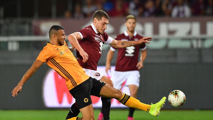 TURIN, ITALY - AUGUST 22: Andrea Belotti (R) of Torino is tackled by Romain Saiss of Wolverhampton Wanderers during the UEFA Europa League Playoffs 1st Leg match between Torino and Wolverhampton Wanderers at Stadio Olimpico on August 22, 2019 in Turin, Italy. (Photo by Valerio Pennicino/Getty Images) TURIN, ITALY - AUGUST 22: Andrea Belotti (R) of Torino is tackled by Romain Saiss of Wolverhampton Wanderers during the UEFA Europa League Playoffs 1st Leg match between Torino and Wolverhampton Wanderers at Stadio Olimpico on August 22, 2019 in Turin, Italy. (Photo by Valerio Pennicino/Getty Images)