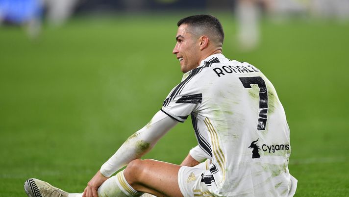 TURIN, ITALY - DECEMBER 22: Cristiano Ronaldo of Juventus reacts during the Serie A match between Juventus and ACF Fiorentina at Allianz Stadium on December 22, 2020 in Turin, Italy. Sporting stadiums around Italy remain under strict restrictions due to the Coronavirus Pandemic as Government social distancing laws prohibit fans inside venues resulting in games being played behind closed doors. (Photo by Valerio Pennicino/Getty Images) TURIN, ITALY - DECEMBER 22: Cristiano Ronaldo of Juventus reacts during the Serie A match between Juventus and ACF Fiorentina at Allianz Stadium on December 22, 2020 in Turin, Italy. Sporting stadiums around Italy remain under strict restrictions due to the Coronavirus Pandemic as Government social distancing laws prohibit fans inside venues resulting in games being played behind closed doors. (Photo by Valerio Pennicino/Getty Images)