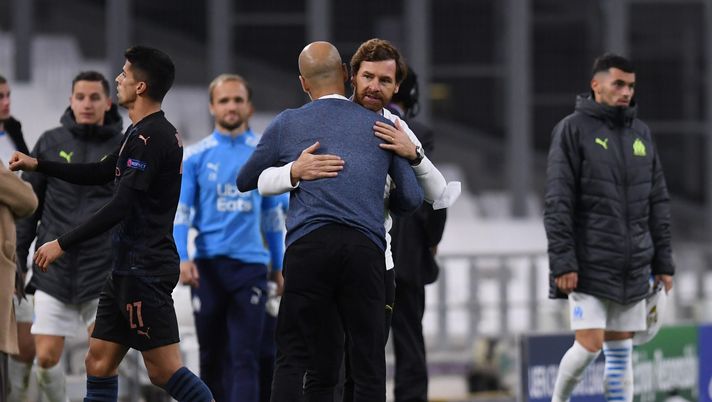 MARSEILLE, FRANCE - OCTOBER 27: Andre Villas-Boas, Head Coach of Marseille and Pep Guardiola, Manager of Manchester City embrace after the UEFA Champions League Group C stage match between Olympique de Marseille and Manchester City at Stade Velodrome on October 27, 2020 in Marseille, France. Football Stadiums around Europe remain empty due to the Coronavirus Pandemic as Government social distancing laws prohibit fans inside venues resulting in fixtures being played behind closed doors. (Photo by Alex Caparros/Getty Images) MARSEILLE, FRANCE - OCTOBER 27: Andre Villas-Boas, Head Coach of Marseille and Pep Guardiola, Manager of Manchester City embrace after the UEFA Champions League Group C stage match between Olympique de Marseille and Manchester City at Stade Velodrome on October 27, 2020 in Marseille, France. Football Stadiums around Europe remain empty due to the Coronavirus Pandemic as Government social distancing laws prohibit fans inside venues resulting in fixtures being played behind closed doors. (Photo by Alex Caparros/Getty Images)