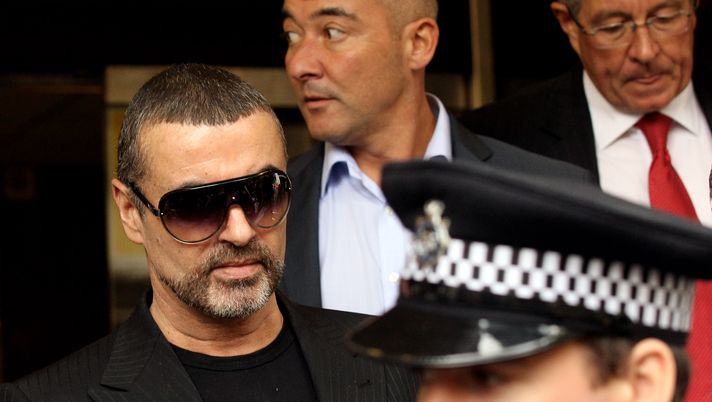 LONDON, ENGLAND - AUGUST 24: Singer George Michael (L) leaves Highbury Corner Magistrates Court on August 24, 2010 in London, England. Mr Michael pleaded guilty to driving under the influence of drugs and possessing cannabis after he crashed his car into a photo processing shop in London on July 4, 2010. (Photo by Oli Scarff/Getty Images) LONDON, ENGLAND - AUGUST 24: Singer George Michael (L) leaves Highbury Corner Magistrates Court on August 24, 2010 in London, England. Mr Michael pleaded guilty to driving under the influence of drugs and possessing cannabis after he crashed his car into a photo processing shop in London on July 4, 2010. (Photo by Oli Scarff/Getty Images)