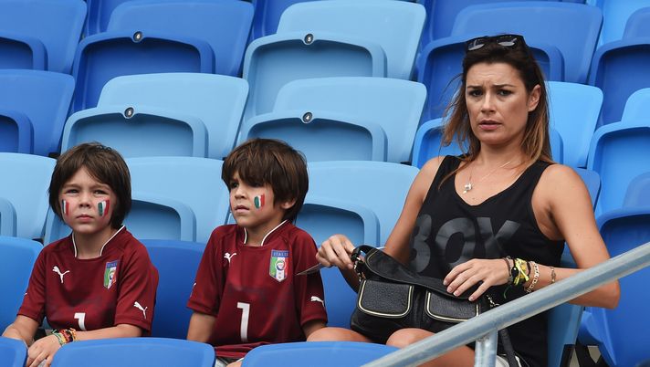 NATAL, BRAZIL - JUNE 24:  Alena Seredova, wife of Gianluigi Buffon of Italy, looks on looks on with their sons David and Louis ahead of the 2014 FIFA World Cup Brazil Group D match between Italy and Uruguay at Estadio das Dunas on June 24, 2014 in Natal, Brazil.  (Photo by Claudio Villa/Getty Images)