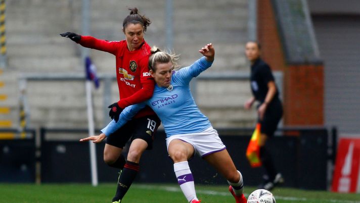 LEIGH, ENGLAND - JANUARY 25: Lauren Hemp of Manchester City battles for possession with Jane Ross of Manchester United during the Women's FA Cup Forth Round match between Manchester United Women and Manchester City Women at Leigh Sports Village on January 25, 2020 in Leigh, England. (Photo by Morgan Harlow/Getty Images) 