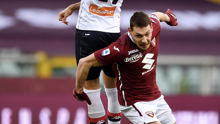 TURIN, ITALY - FEBRUARY 13: Ivan Radovanovic of Genoa C.F.C. wins a header from Andrea Belotti of Torino FC during the Serie A match between Torino FC and Genoa CFC at Stadio Olimpico di Torino on February 13, 2021 in Turin, Italy. Sporting stadiums around Italy remain under strict restrictions due to the Coronavirus Pandemic as Government social distancing laws prohibit fans inside venues resulting in games being played behind closed doors. (Photo by Valerio Pennicino/Getty Images) TURIN, ITALY - FEBRUARY 13: Ivan Radovanovic of Genoa C.F.C. wins a header from Andrea Belotti of Torino FC during the Serie A match between Torino FC and Genoa CFC at Stadio Olimpico di Torino on February 13, 2021 in Turin, Italy. Sporting stadiums around Italy remain under strict restrictions due to the Coronavirus Pandemic as Government social distancing laws prohibit fans inside venues resulting in games being played behind closed doors. (Photo by Valerio Pennicino/Getty Images)